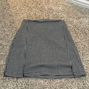 VINTAGE Brandy Melville Plaid Skirt with 2 little cut outs on each leg